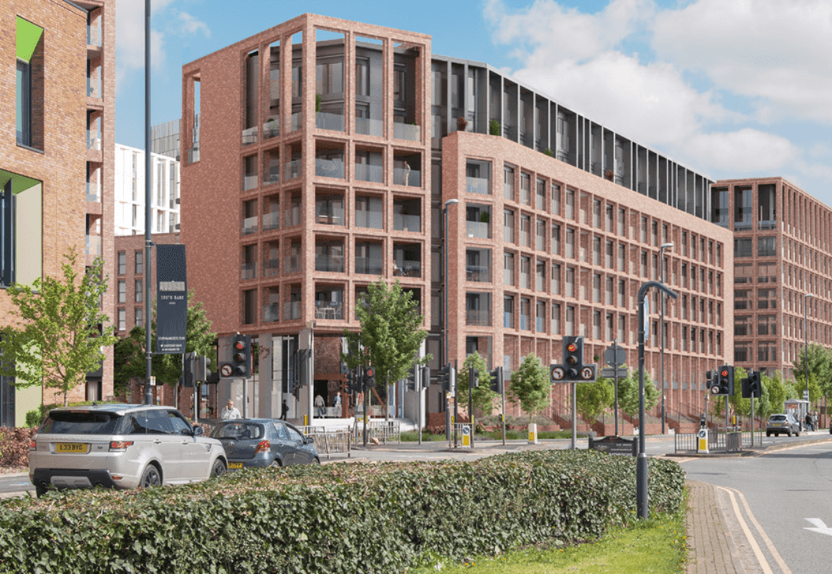 Points Cross Block C, Leeds: street-view render of red-brick mid-rise apartment blocks alongside a tree-lined road with traffic-light junction, Guinness Partnership shared-ownership scheme