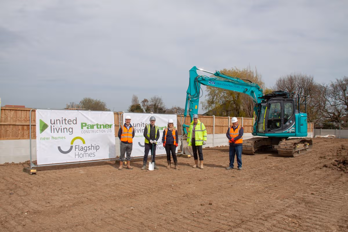 United Living and Platform Housing groundbreaking ceremony with delivery team and excavator
