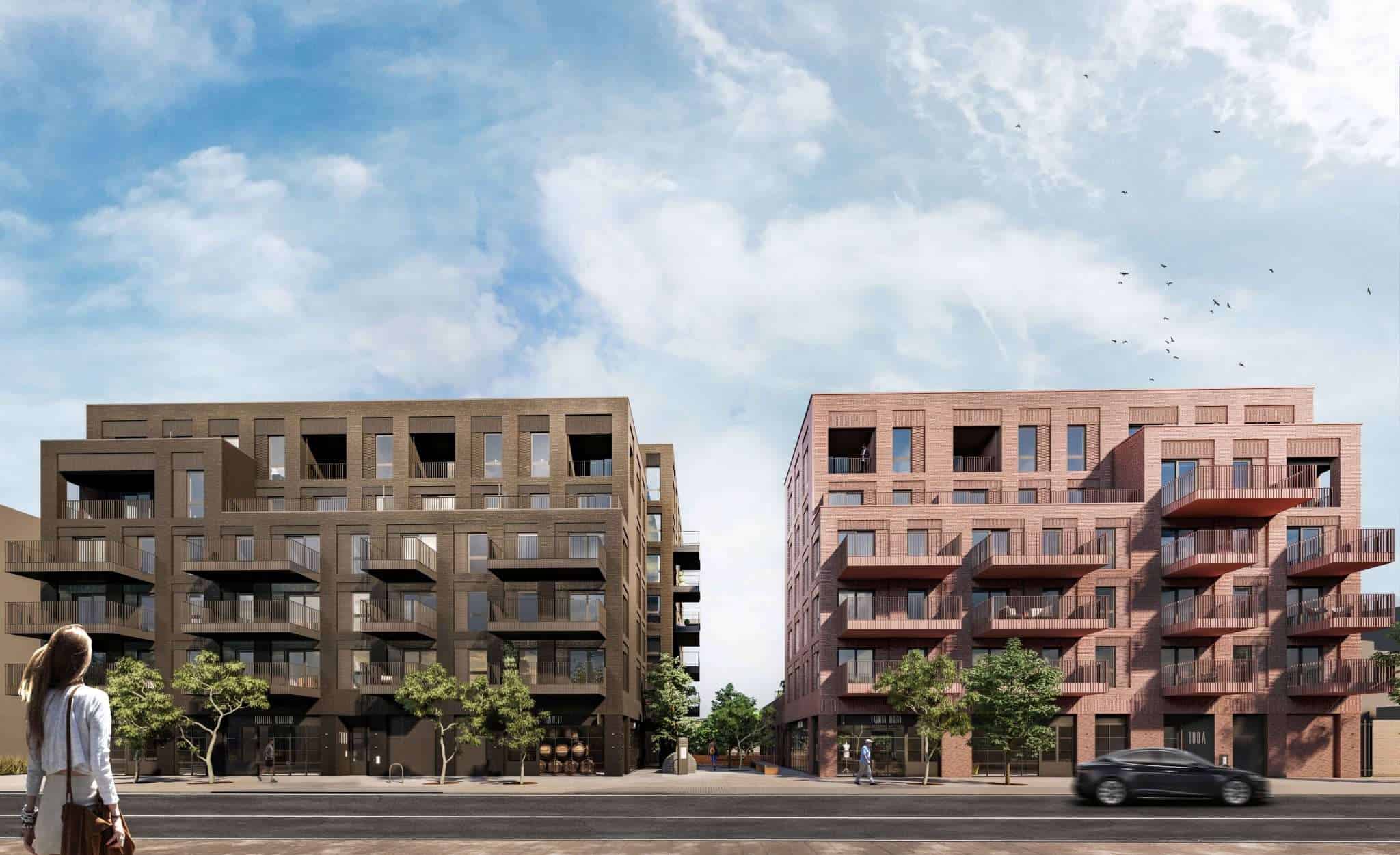 Finningley, Doncaster (Woodlark Place): render of two six-storey apartment blocks in brown and red brick facing a tree-lined street, with workshop-style ground-floor frontages, Guinness Partnership scheme