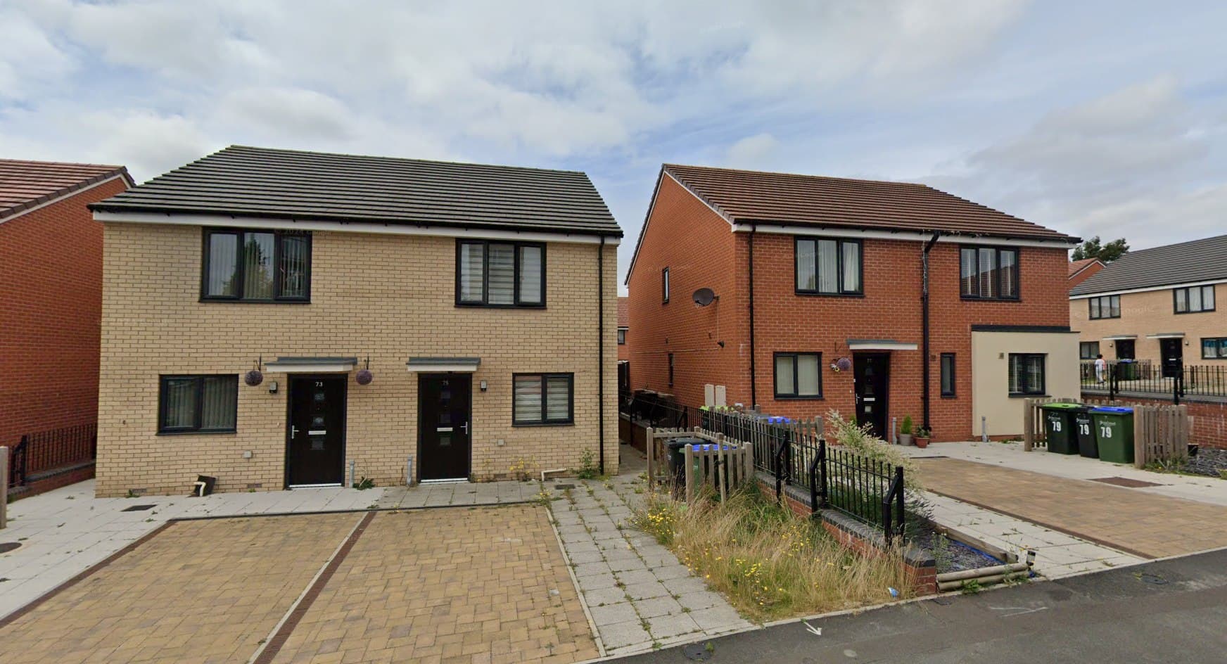 West Road, Sandwell: modern brick semi-detached homes with black-framed windows and block-paved driveways, affordable housing for Sandwell MBC.