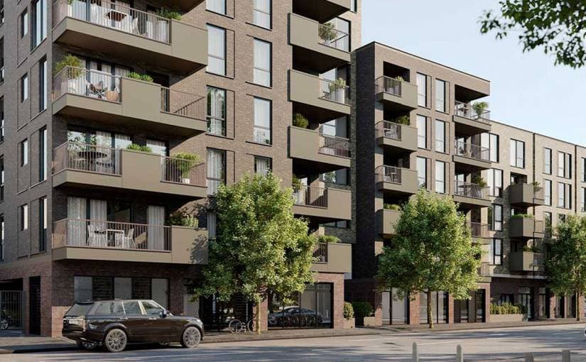 Wyndham Studios, Camberwell: mid-rise brick apartment building with planted balconies and street-tree frontage on Wyndham Road, A2Dominion mixed-tenure scheme